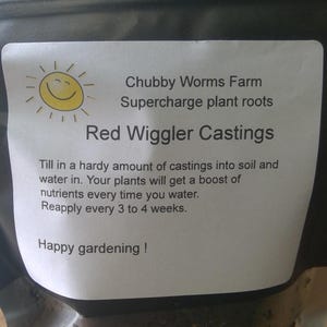 May include: A white bag with a label that reads "Chubby Worms Farm Supercharge plant roots Red Wiggler Castings". The label also includes instructions for using the castings: "Till in a hardy amount of castings into soil and water in. Your plants will get a boost of nutrients every time you water. Reapply every 3 to 4 weeks. Happy gardening!"