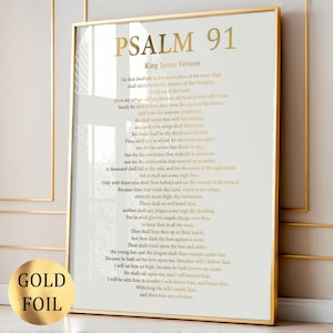 May include: A framed print of Psalm 91 from the King James Version. The text is in gold lettering on a white background, with a gold frame. A gold foil sticker is in the lower left corner.