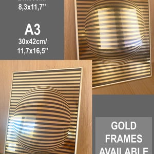 May include: A framed wall art print featuring a black and gold horizontal striped pattern with a central 3D sphere illusion. Text includes A4 21x30cm/8.3x11.7 inches, A3 30x42cm/11.7x16.5 inches, and the words GOLD FRAMES AVAILABLE.