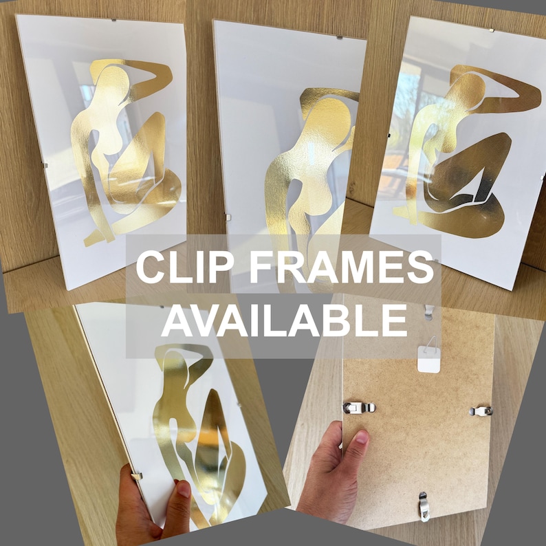 May include: Three rectangular clip frames featuring a gold foil abstract human figure silhouette on a white background. The frames include metal clips on the back for securing the backing board to the front panel. Text reads CLIP FRAMES AVAILABLE.