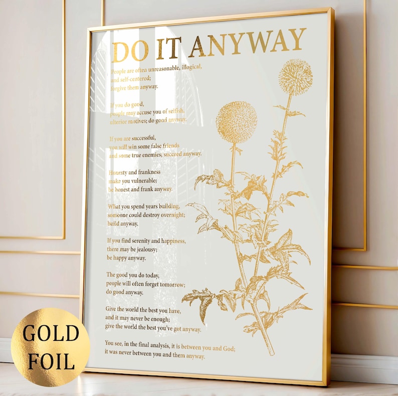 May include: Gold foil framed print with the words "DO IT ANYWAY" in gold lettering. The print features a gold botanical illustration and a motivational poem. The words "GOLD FOIL" are printed on a gold foil sticker in the lower left corner.