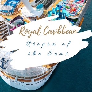 May include: An aerial view of the Royal Caribbean Utopia of the Seas cruise ship. The ship is white with blue accents and features a large water park with slides and a pool. The ship is docked in a blue body of water.