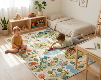 May include: A rectangular area rug featuring a colorful illustrated town map with roads, houses, trees, a pond, and a playground. The design includes a rainbow, a hot air balloon, and various vehicles printed on a light background for play.