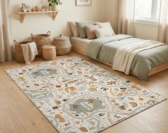 May include: A rectangular area rug with a playful road map design in cream, blue, and tan. The rug features illustrations of cars, buildings, and animals, creating a whimsical scene. The rug is placed in a bedroom setting.