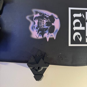 Snowboard wall mount