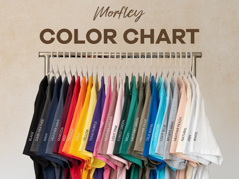 May include: Color chart showing 24 different t-shirt colors, including black, navy, maroon, red, orange, gold, yellow, team purple, charity pink, heather mauve, light pink, forest green, kelly, military green, heather olive, true royal, turquoise, light blue, sports gray, heather peach, natural, ash, and white.