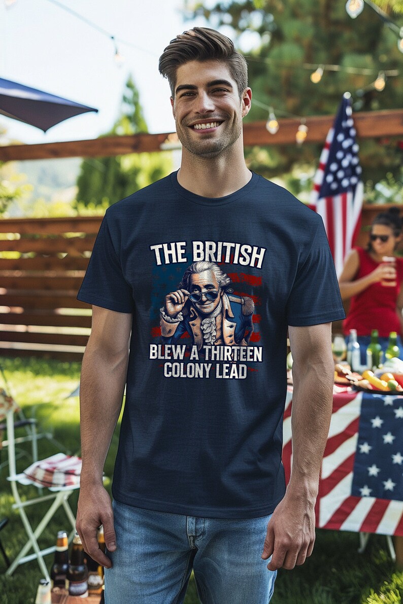 George Washington smiling and peeking over his sunglasses, because the British blew a 13 colony lead. Funny T-shirt