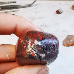 Scottish part polished medium jasper pebble