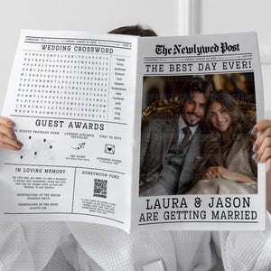 Può includere: Un giornale con il titolo "The Newlywed Post" e il testo "The Best Day Ever!" viene tenuto in alto. Il giornale presenta una foto di una coppia e il testo "LAURA & JASON ARE GETTING MARRIED".