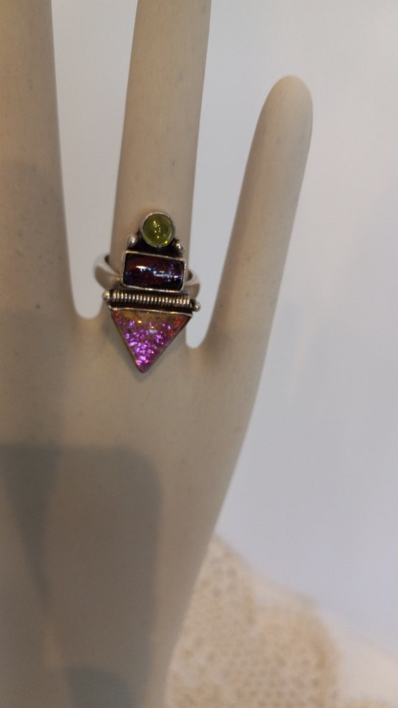 Sterling 925 Ring.  Peridot stone on top and varia