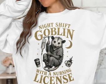 Night Shift Goblin Nurse Opossum T-Shirt | Funny RN Gift | Healthcare Worker Vintage Faux Gold Print Medical Tee