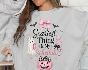 Funny Nurse Halloween T-Shirt | Scariest Schedule Ghost Nurse Tee | Spooky Pink Pumpkin Stethoscope Shirt for RN LPN Students