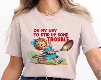 Stirring Mischief Tee: Retro Cartoon Graphic T-Shirt