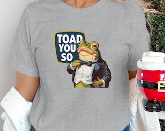Lustiges Frosch-T-Shirt, schrullige Krötengrafik, niedliches Tier-T-Shirt, humorvolle Freizeitkleidung, stilvolle Krötenkunst, einzigartiges grafisches T-Shirt