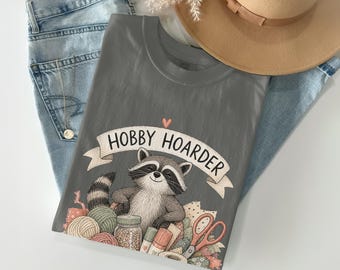 Hobby Hoarder With a Vision T-Shirt | Funny Raccoon Crafting Tee | Creative Crafter Gift | Sewing Knitting Lover Apparel