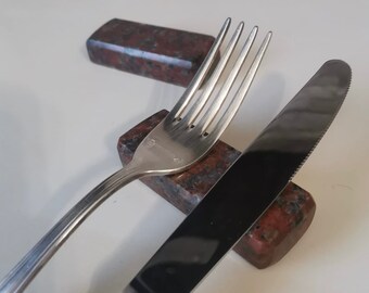 Red granite cutlery rest