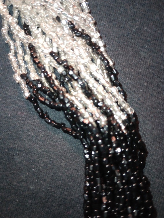 Multiple strands of small beads, silver and black… - image 3