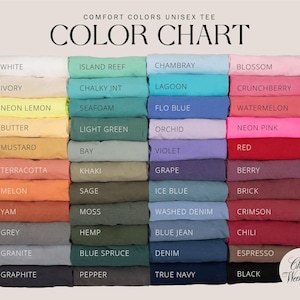 May include: A color chart for Comfort Colors unisex t-shirts featuring forty-eight folded fabric swatches in various shades. Each swatch is labeled with its corresponding color name, including white, yellow, green, blue, pink, red, and black.
