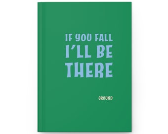 May include: A green journal featuring the text "IF YOU FALL I'LL BE THERE" in light blue, and the word "GROUND" in white. The journal has a simple, uncluttered design.