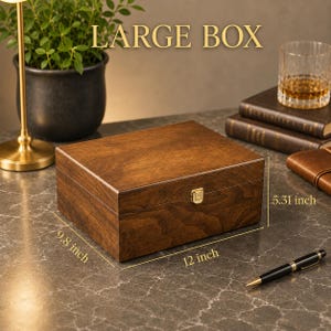 May include: A rectangular wooden box with a dark brown finish and a gold-colored metal latch. The box features text reading LARGE BOX and dimensions of 12 inches by 9.8 inches by 5.31 inches printed on the image, indicating its size.