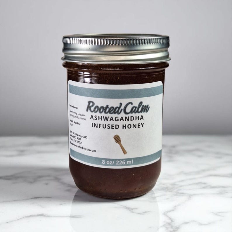 Ashwagandha honey on a marble countertop.