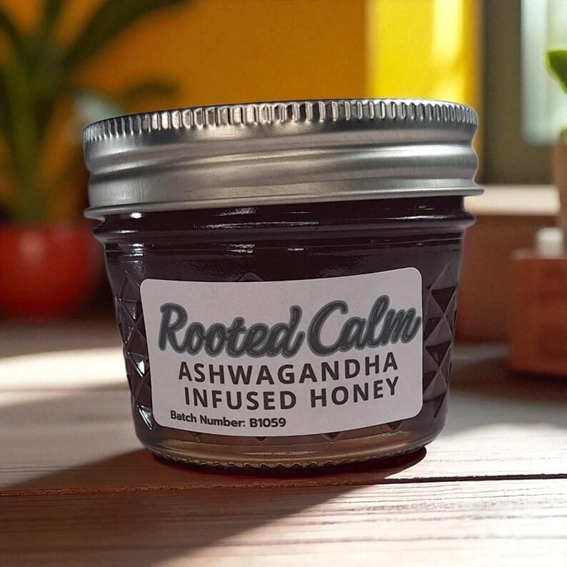 Forward-facing 4 oz jar of ashwagandha herbal infused honey on a wooden surface