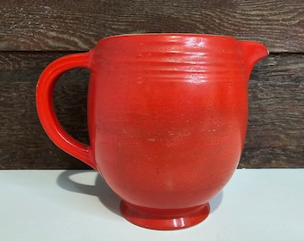 Red pitcher from Hall's Superior Quality Dishware. Made in the USA. Vintage 1930's