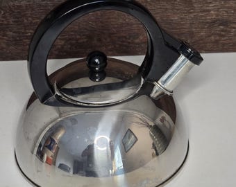 Copco Whistling Tea Kettle, Polished Stainless Steel, Black Ergonomic Handle, Flip Spout, Vintage Style Stovetop Kettle
