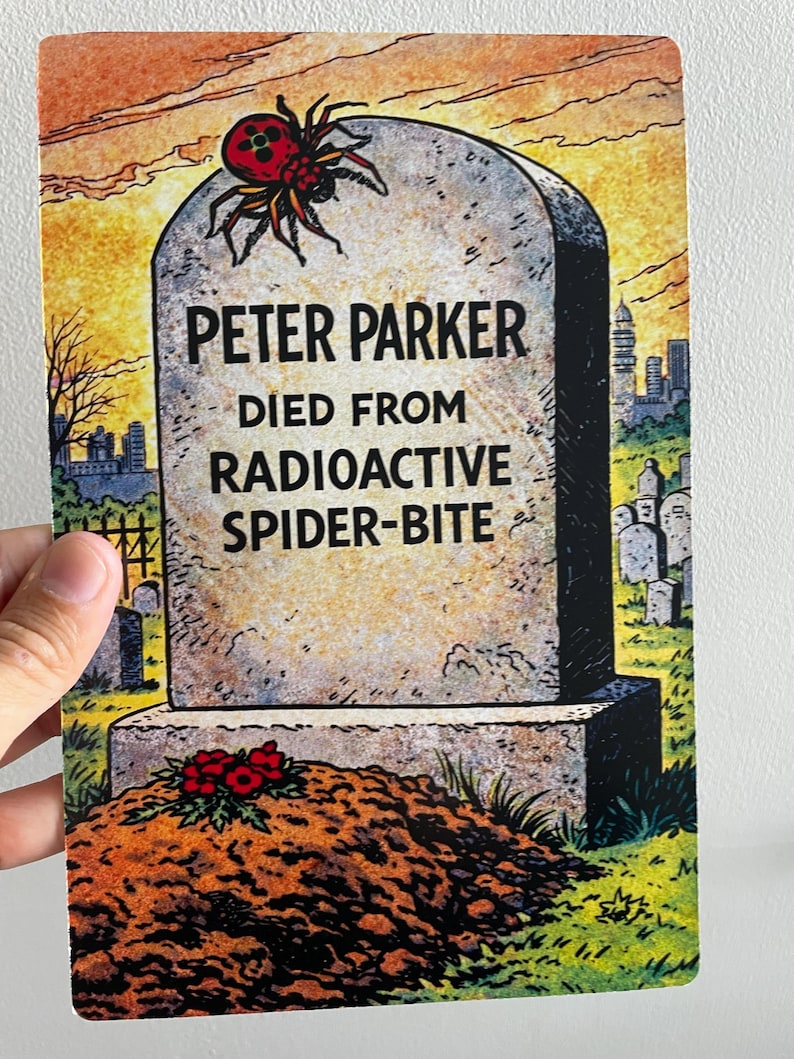 May include: A humorous illustration depicts a tombstone with the inscription "PETER PARKER DIED FROM RADIOACTIVE SPIDER-BITE." A red and black spider sits atop the stone. The background shows a sunset and a city skyline.