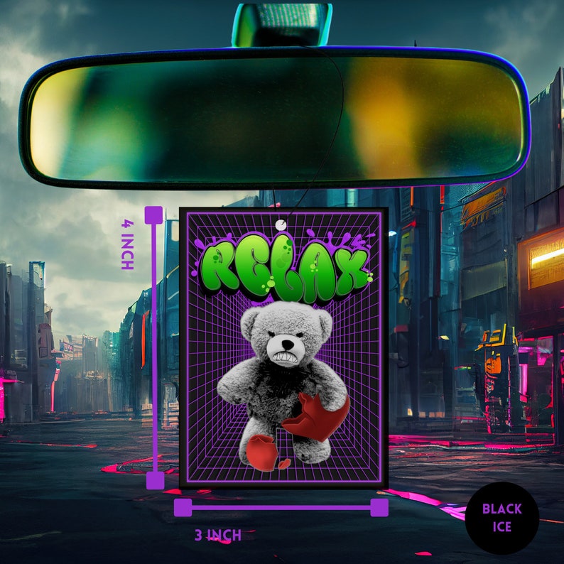 May include: A black car air freshener with a green "RELAX" graphic and a gray teddy bear holding a red heart. The air freshener is 3 inches wide and 4 inches tall.
