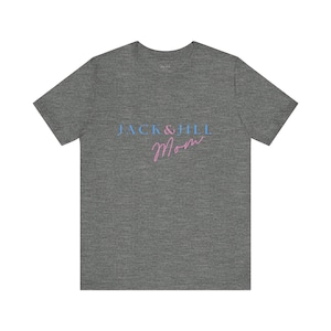 May include: A heather grey t-shirt with the text "JACK & JILL Mom" in blue and pink lettering.