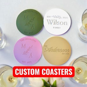 May include: Four custom round coasters in green, white, pink, and gold. Each coaster features a family name, initials, and the year 2025. The text "CUSTOM COASTERS" is displayed in a red box.