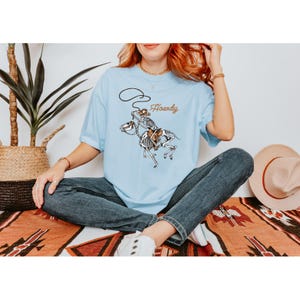 Comfort Colors Howdy Skeleton Cowboy T-Shirt: Western Rodeo Skull Tee