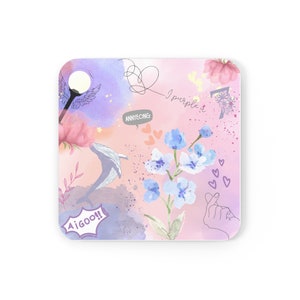 May include: Square coaster with a watercolor design featuring a whale, flowers, and the text "I purple you." The design includes a hand making a heart shape, a street lamp, and the word "Aigoo!!". The background is a mix of pink, purple, and blue.