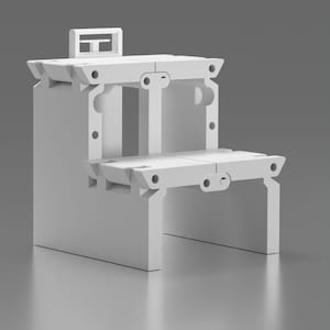 May include: White plastic modular shelving unit with two levels. The unit is made of interlocking pieces that can be assembled in various configurations.