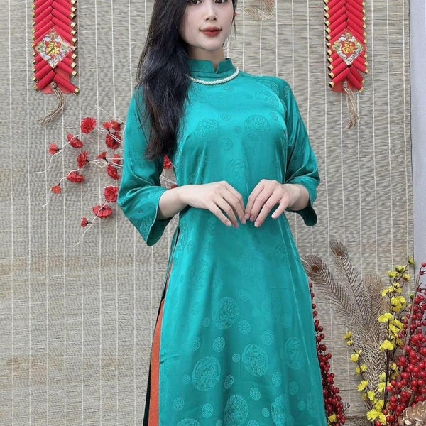 The “Ao Dai”, Vietnamese traditional dress. Handcraft. Modernized "Ao Dai". Ao Dai Cach Tan