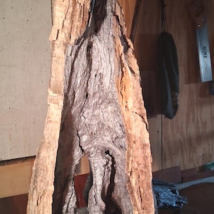 Escultura hecha a mano de madera flotante