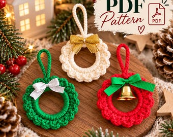 May include: Three crocheted circular ornaments in green, cream, and red, each featuring a hanging loop. The green ornament has a white ribbon bow, the cream one has a gold glitter bow, and the red one has a green ribbon bow with a gold bell.
