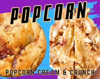 May include: An image of a popcorn-flavored cookie, with the word "POPCORN" in bold, black, outlined letters at the top. The cookie is cut in half, revealing a creamy filling. The text "POPCORN CREAM & CRUNCH" is at the bottom.