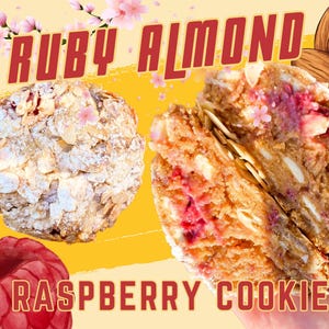 May include: A close-up of a raspberry cookie with a ruby almond filling. The cookie is split in half, revealing the pink raspberry filling. The cookie is topped with sliced almonds and powdered sugar. The text "RUBY ALMOND RASPBERRY COOKIE" is written in red letters on a yellow background.
