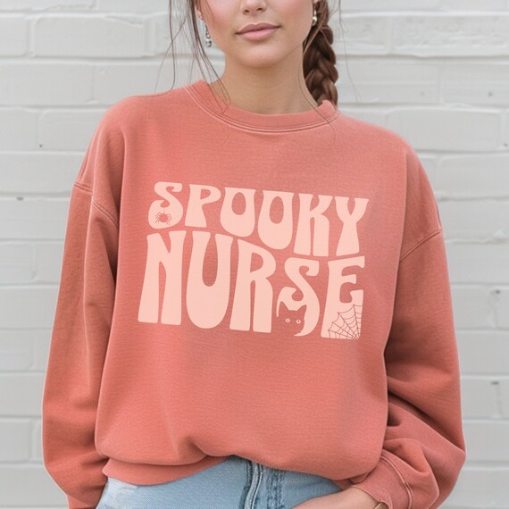 Cute Halloween Spooky Nurse Sweater, trendy Fall oversized shirt, great gift for pediatric, NICU, maternal nurses