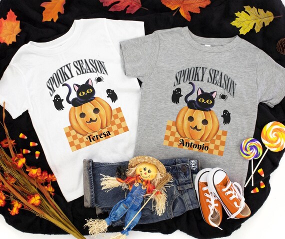 Personalized Spooky Halloween Kids Tee-shirt with Pumpkin, Black Cat, and Little Ghosts on checkered ground, great Cat Kids gift idea! -