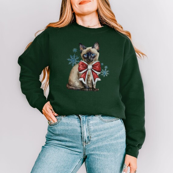 Christmas Coquette Siamese Kitten Crewneck Sweatshirt, Kitty with Red Bow Winter Snowflakes Cat Lover Gift, Festive Pullover for Pet Owner