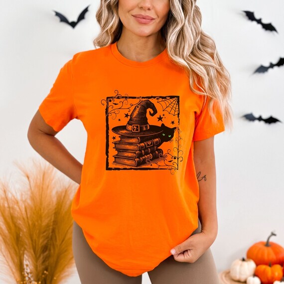 Vintage Halloween Trendy Tee, Spooky Graphic of a Peeking Black Cat with green eyes, Witches Hat and Magic Spell Books~great present for her