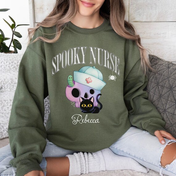 Personalized Name Spooky Nurse Sweater with Black Cat and Skull Nurse, Funny Halloween Sweatshirt, Gift for Pediatric Nurse