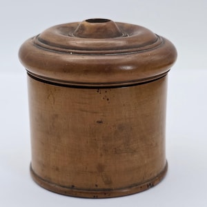 Antik rund kruka med skruvlock i satinträ