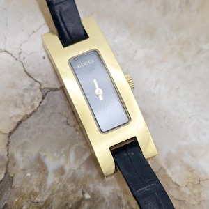 GUCCI 3900L 腕時計　ブラック×ゴールド GUCCI/グッチ レディース 腕時計 ゴールド×ブラック文字盤