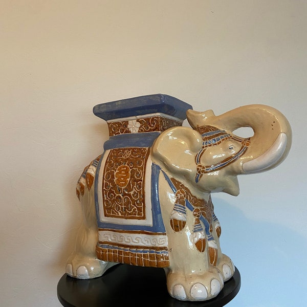 Beautiful ceramic elephant plant table