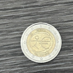 Moneda de 2 euro España 2009. Conmemoratoria UEM(1999-2009)Para coleccionistas. Edición limitada. Precio negociable.