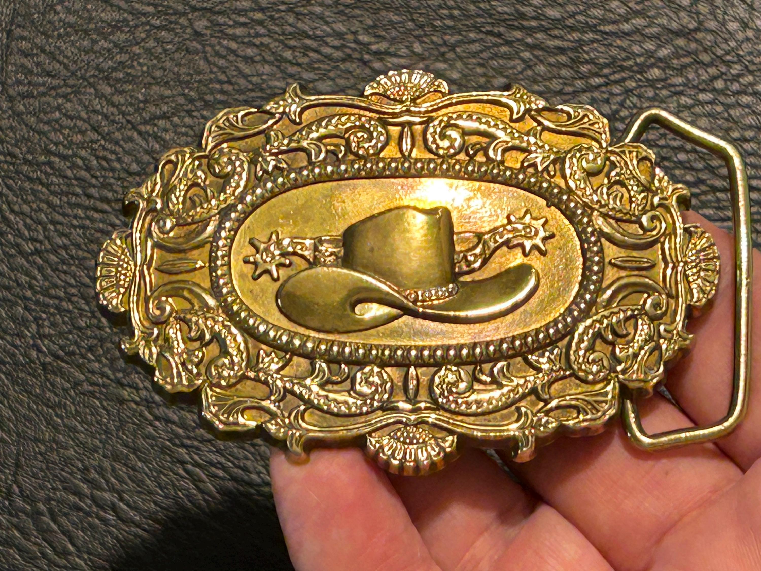 1981 Cowboy Hat and Spurs Belt Buckle, Solid Brass by Barons  display picture 1